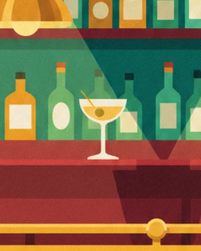 A cocktail glass garnished with an olive on the red counter in front of the bottles