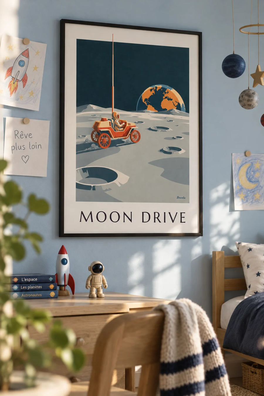 Poster of a lunar rover driving between the Moon’s craters: framed on the wall