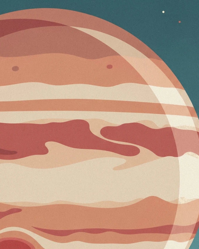 The cream, orange and red bands of Jupiter against the dark blue sky