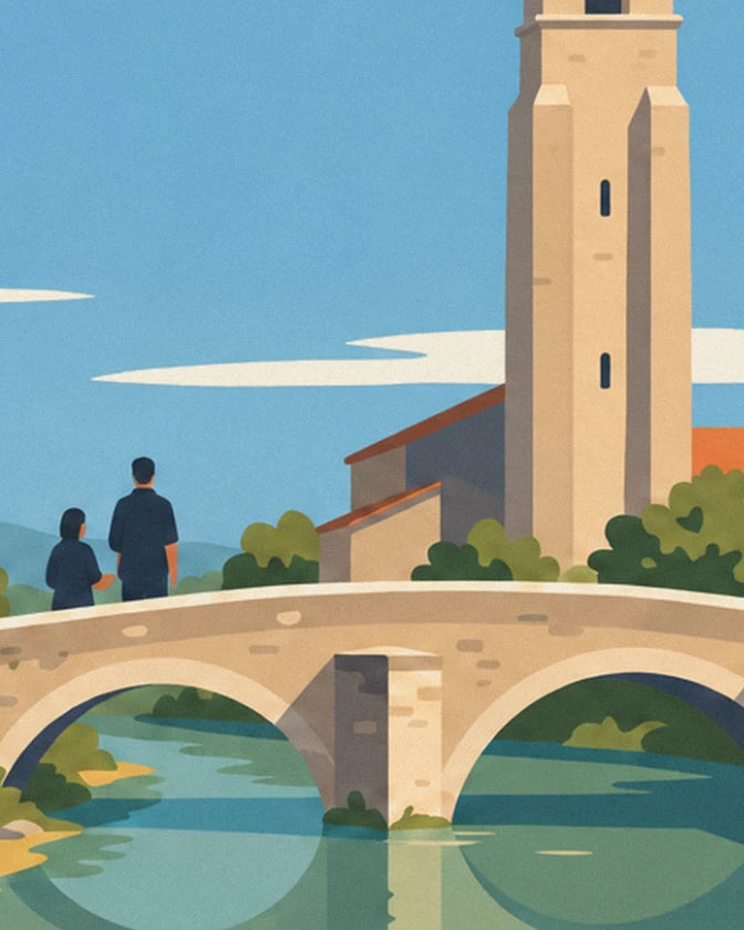 The stone bridge with 2 arches over the river, with 2 passers-by in front of the bell tower