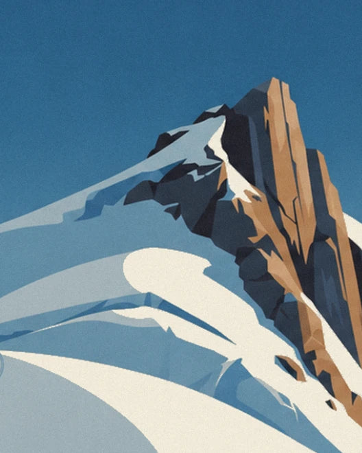 The spire of dark and ochre rock towering over the snowy slopes beneath a deep blue sky