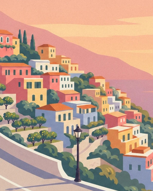 Pastel houses on the hillside and a black lamppost beside the road