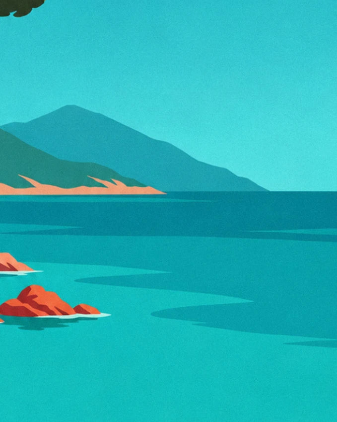 The calm turquoise sea, 2 small red granite islets and the blue-tinged mountain in the distance