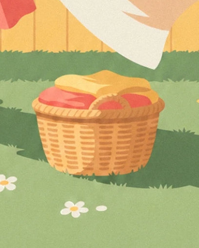 Ein Weidenkorb voller gelber und rosa Wäsche im Gras unter einem weißen Laken