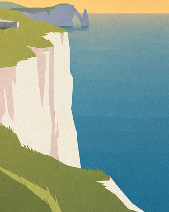 La falaise blanche qui plonge dans la mer bleue, avec l'arche d'Étretat au loin