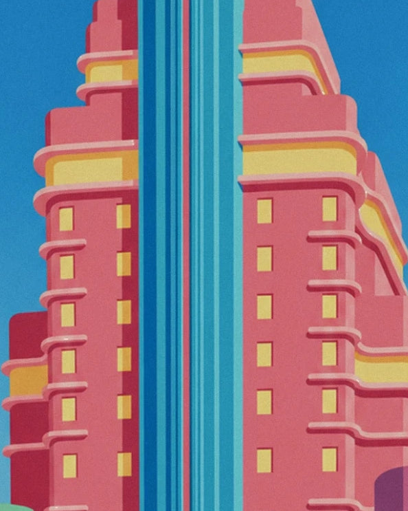 The pink façade with yellow windows and long vertical turquoise bands