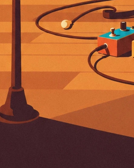 Das orange-türkisfarbene Effektpedal, seine schwarzen Kabel und das Mikrofonstativ auf dem Boden