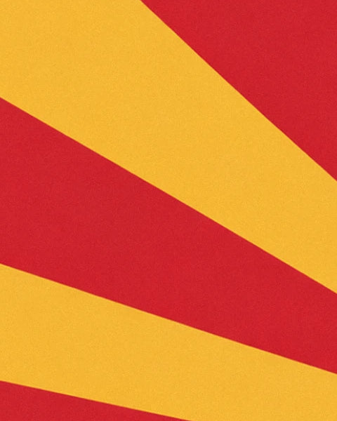 Alternating broad red and yellow rays with a grainy texture