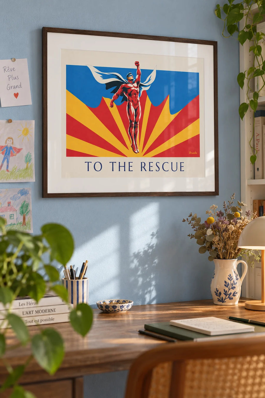 Poster of a comic book superhero on a red and yellow background: framed on the wall
