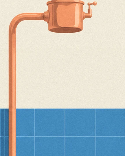 The copper cistern and its long pipe against the blue tiles in the toilets