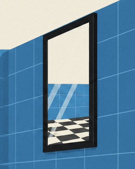 The black-framed mirror reflecting the chequered floor in the toilets