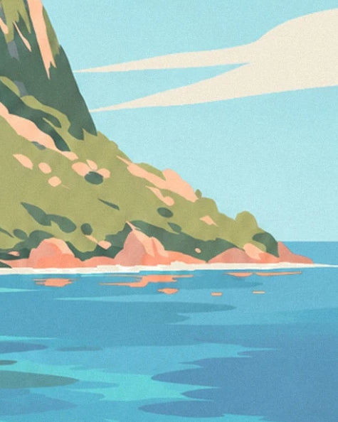 The rocky coast in shades of pink and green, bordered by the blue waters of the lagoon