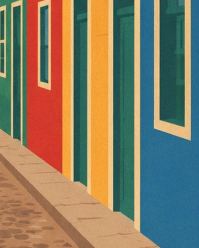 The red, yellow and blue façades with green doors along the paved pavement