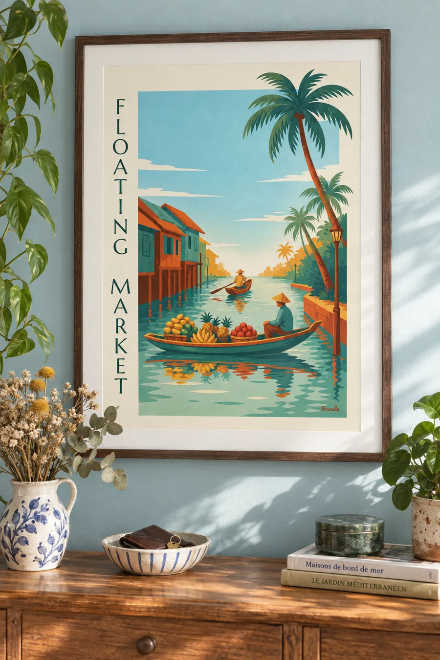 Poster of a tropical floating market and boats loaded with fruit: framed on the wall