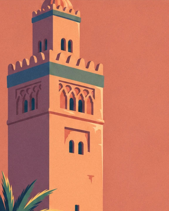 The pink sandstone minaret of the Koutoubia and its ornate arches beneath the evening sky