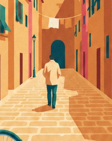 A passer-by seen from behind between ochre façades, beneath hanging laundry
