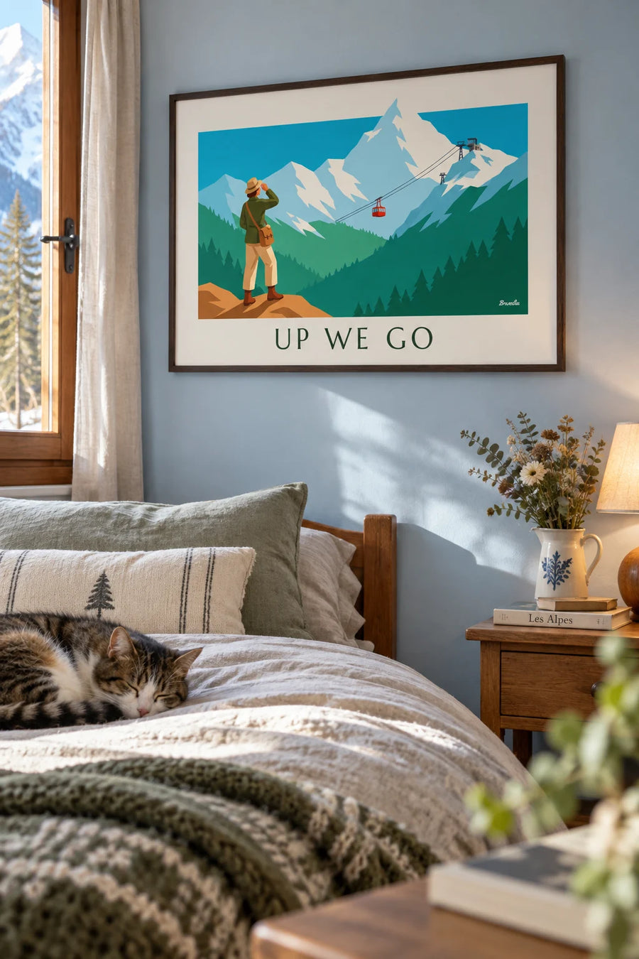 Poster of a hiker facing a cable car and a snow-covered mountain: framed on the wall