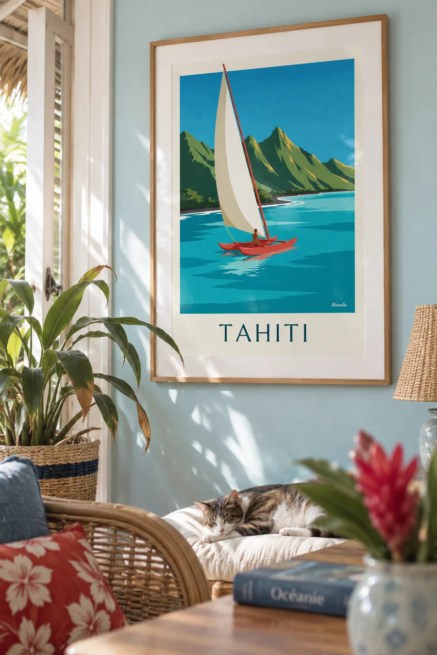 Poster of Tahiti’s mountains and a sailing outrigger canoe in the lagoon: framed on the wall