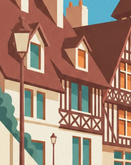 Les villas à colombages, leurs lucarnes et leurs balcons bruns derrière un grand réverbère