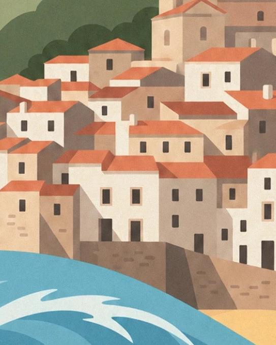 Les maisons de Mundaka aux toits orangés, derrière le quai et la vague bleue