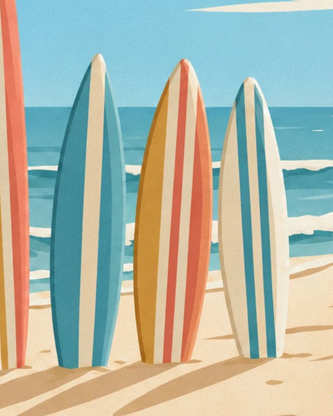 The surfboards with turquoise, cream and coral stripes on the golden sand