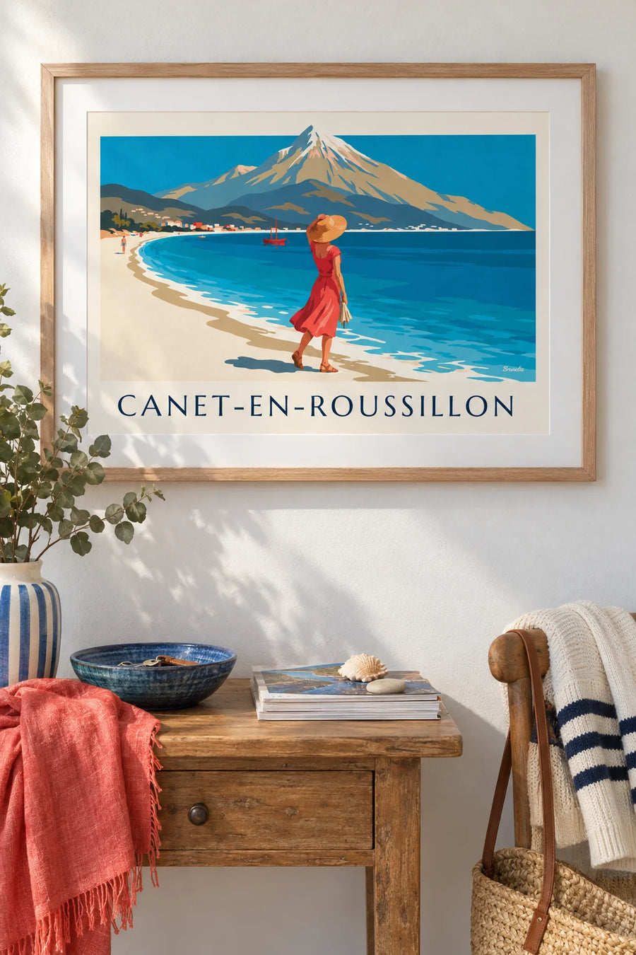 Poster of a woman by the sea in Canet-en-Roussillon: framed on the wall