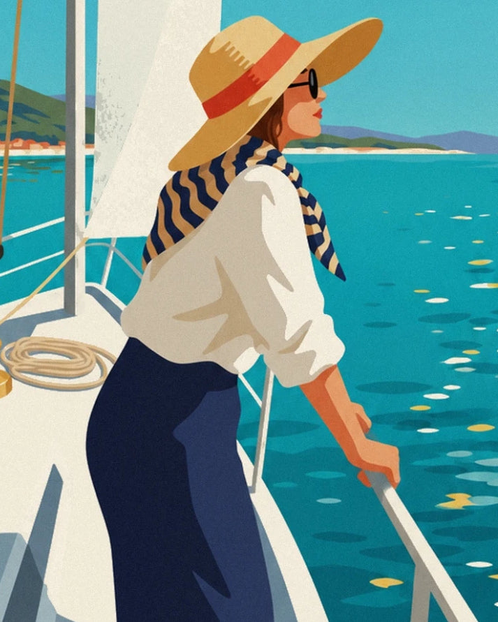 The woman in a straw hat and striped scarf leaning against the sailing boat’s railing