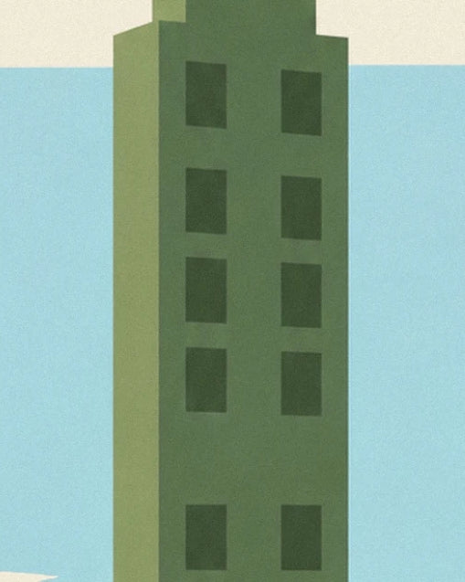 The tall green tower with dark windows against a blue sky