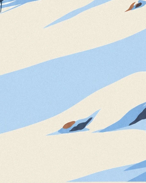 Dark brown rocks in the cream-coloured snow among long blue shadows
