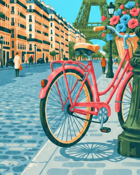 Le vélo corail et son panier de fleurs bleues et roses, garé sur le trottoir pavé