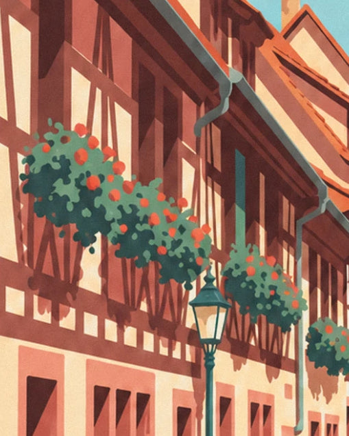 The brown and cream half-timbered façades, their window boxes of red flowers and a green street lamp
