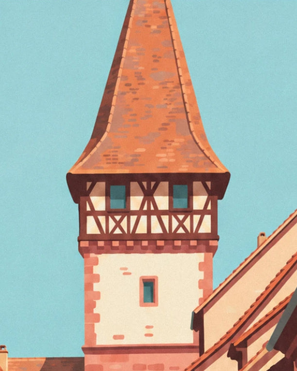 The half-timbered tower with its pointed orange-tiled roof, beneath a pale blue sky