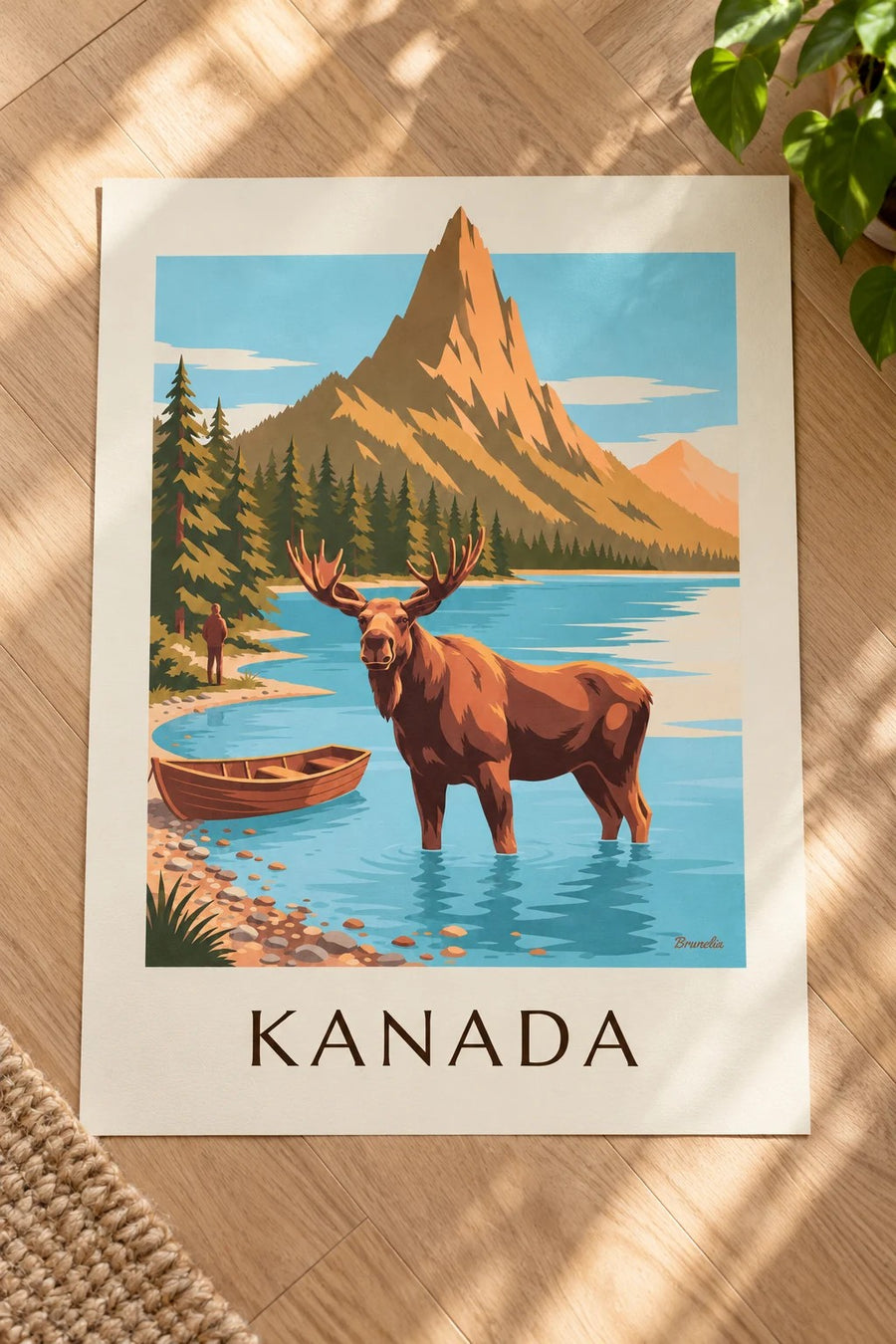Poster Elch im See am Fuß der Berge Kanadas: auf einem Tisch aufgestellt