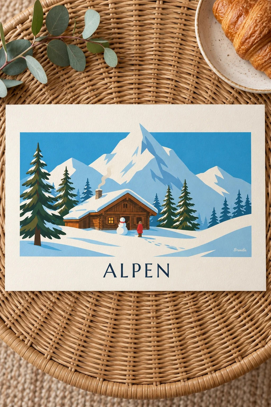 Poster verschneites Chalet und Schneemann in den Alpen: auf einem Tisch aufgestellt