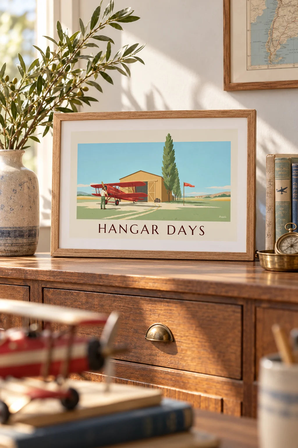 Office: Biplane and wooden hangar airfield poster on the wall