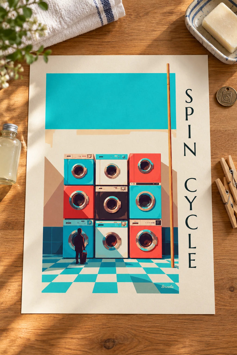 Poster mit 9 bunten Waschmaschinen im Raster : auf einem Tisch aufgestellt