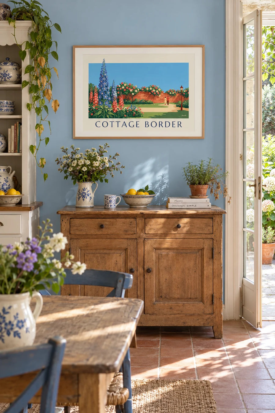Poster of a bed of blue delphiniums in an English garden: framed on the wall