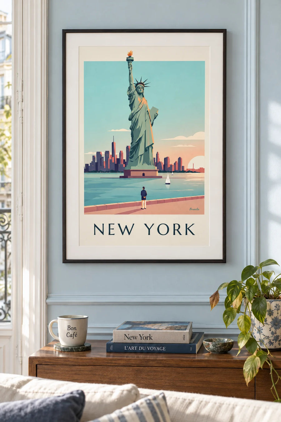 Poster of the Statue of Liberty at sunset: framed on the wall