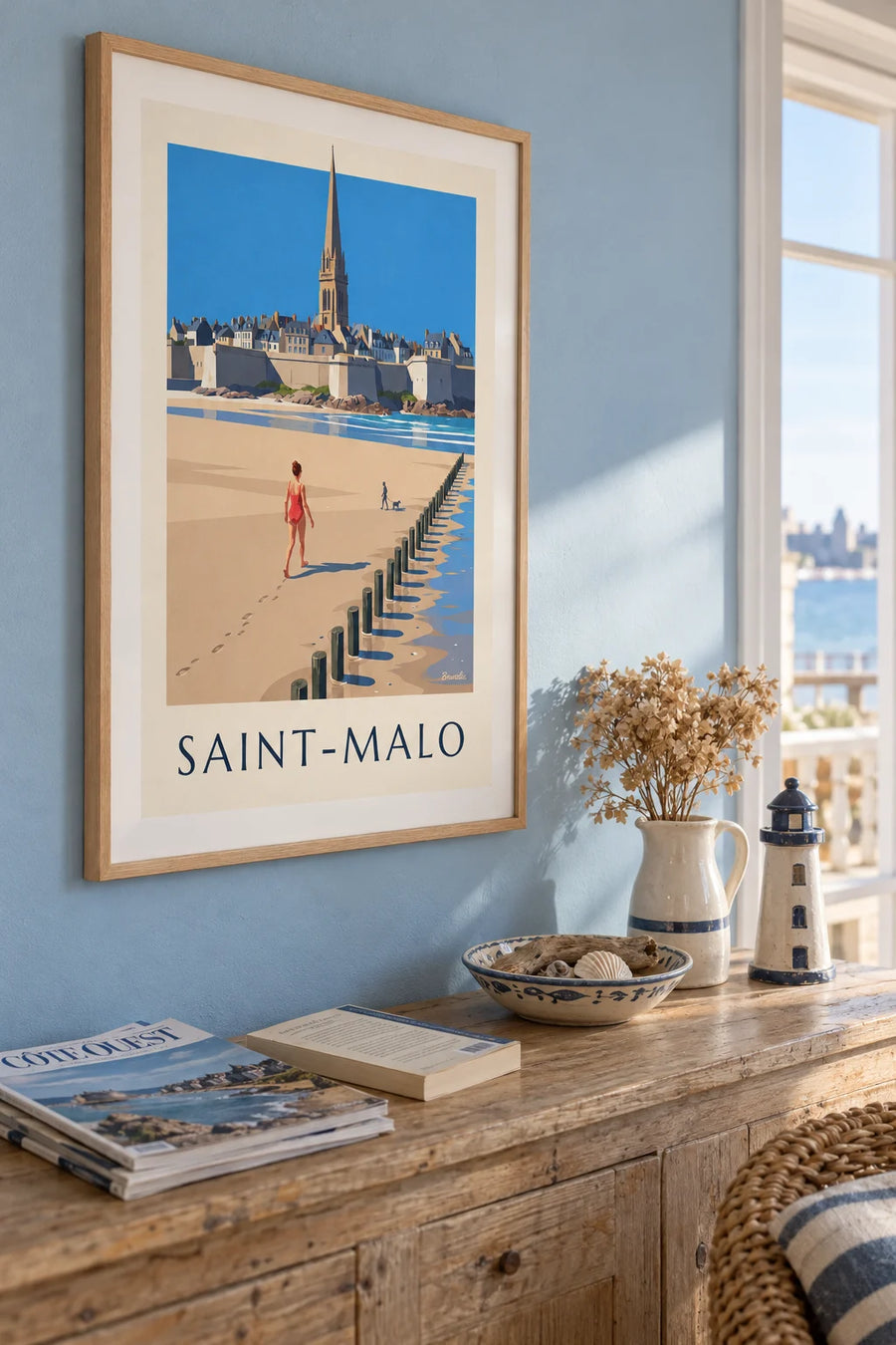 Poster of a woman in a swimsuit on the Sillon beach in Saint-Malo: framed on the wall