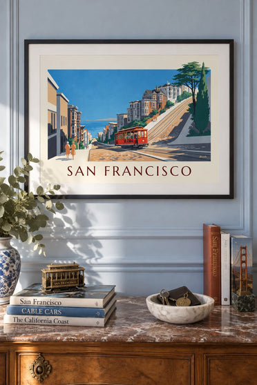 Cable car poster climbing a San Francisco street: framed on the wall
